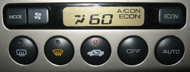 climate control display showing 60F, face vent, A/C ON and ECON