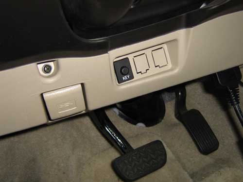 Prius smart key cancel button under driver's side of dash