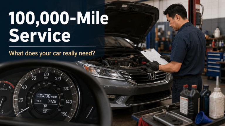 An image of a mechanic making notes on a clipboard in front of a car with the hood up and an odometer displaying 100,000 miles