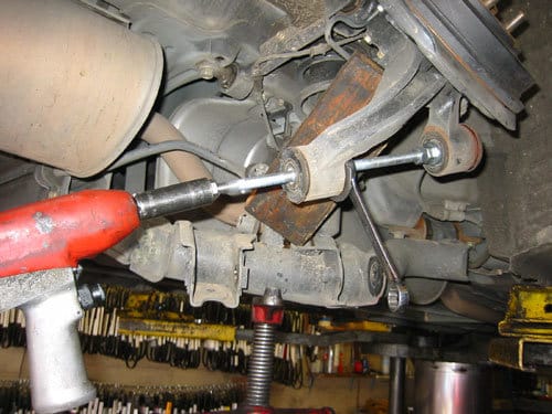 Home made Honda bushing driver removing control arm bushings from a civic