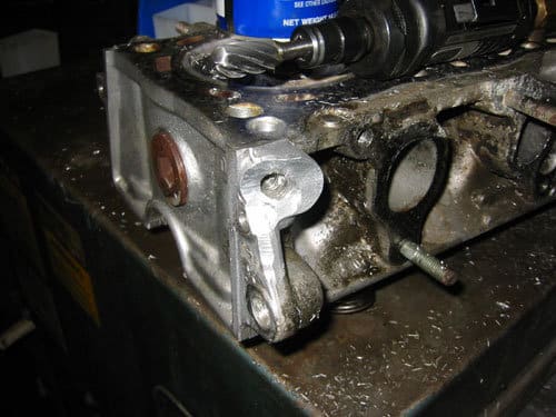 Aluminum cylinder head with damaged area cut away