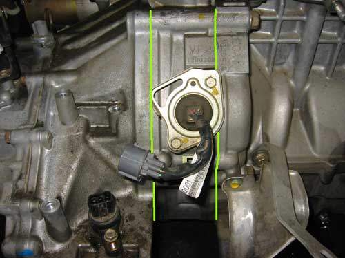 IMA motor highlighted between engine and transmission