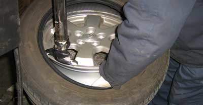 removing a tire from a rim