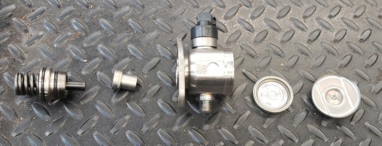 disassembled honda direct injection fuel pump
