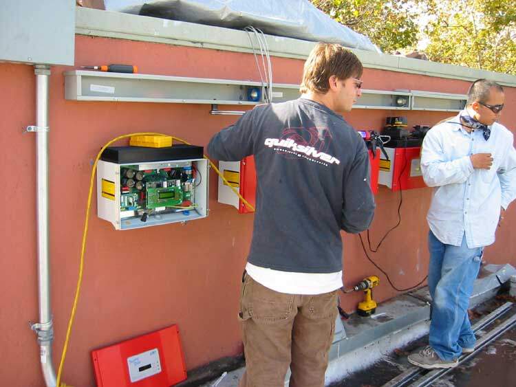 contractors installing inverters for photovoltaic system