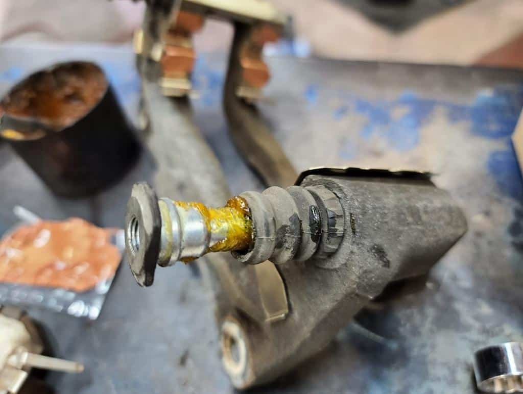 caliper pin greased with silicone grease