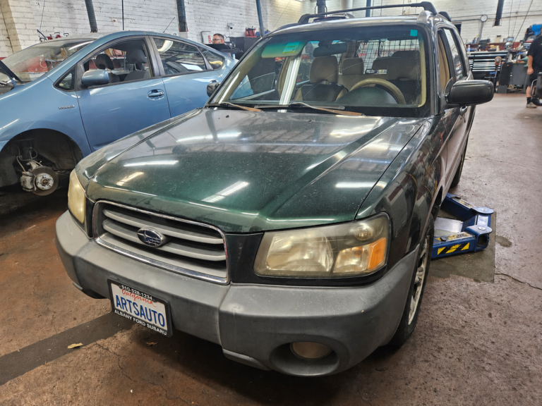 2004 Subaru Forester undergoing P0483 cooling fan diagnosis at Art's Automotive