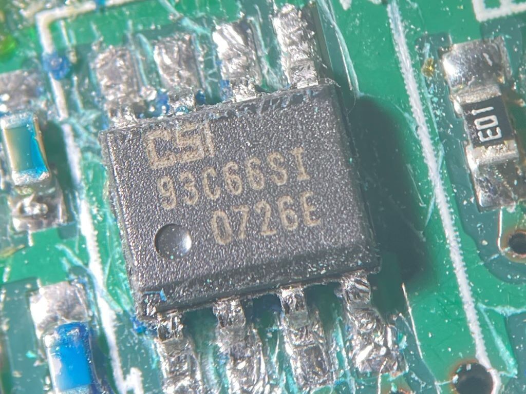 93C66 chip with the solder mask scraped off the chip pins