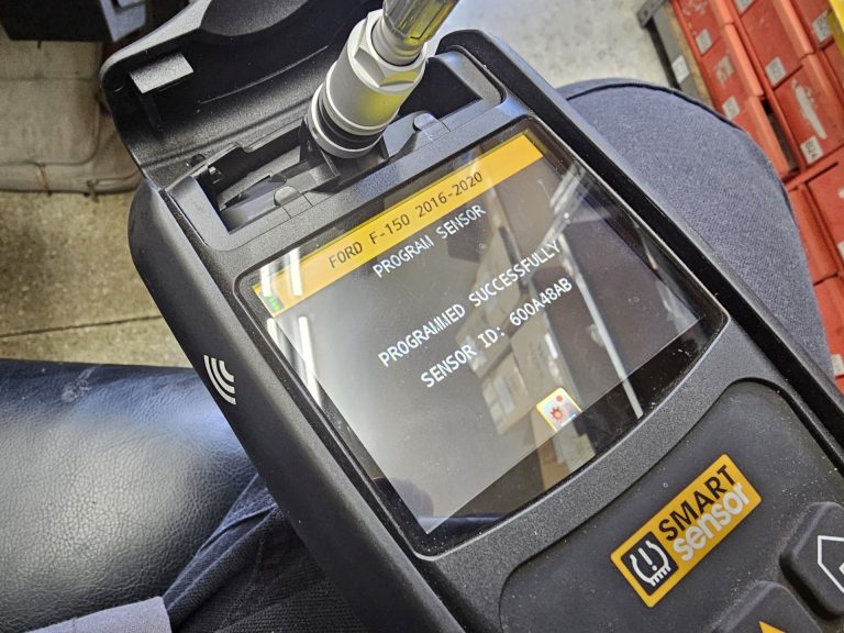 Programming a TPMS sensor using a TPMS tool