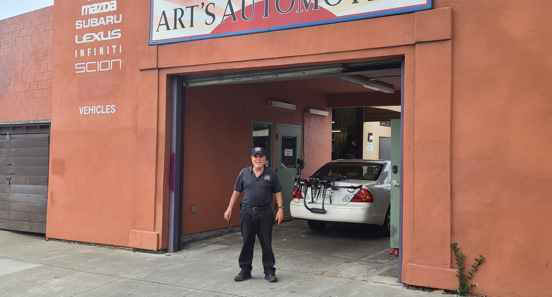 Art standing in front of our shop.