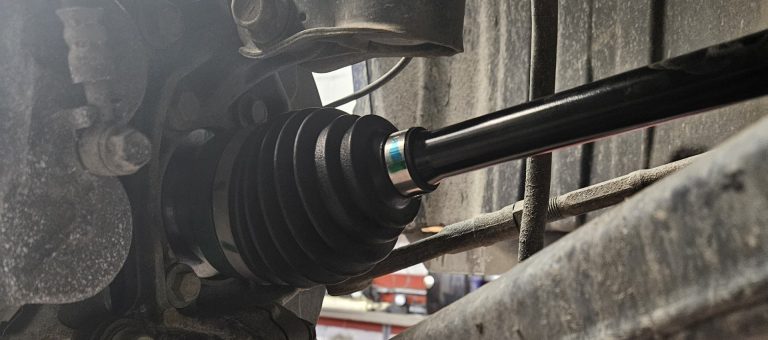 New shiny axle in car after replacement.