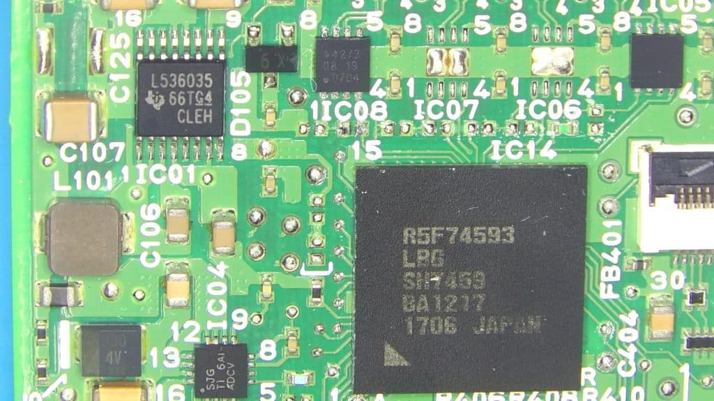 A picture of the circuit board for the Honda multi-purpose camera. In the upper left is a can transceiver chip. In the lower right is a MCU chip.