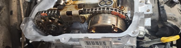 Prius cylinder head with valve cover off and timing marks visible