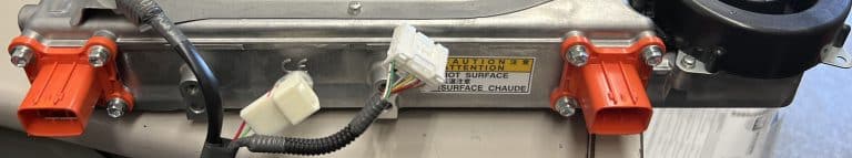 Banner close up of Prius onboard charger.