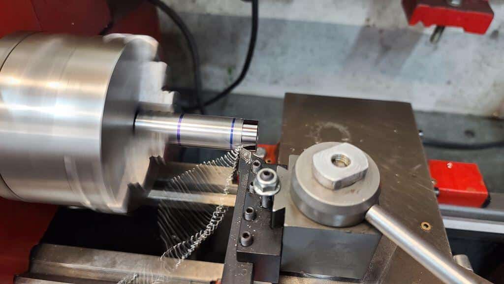 tube being machined in lathe