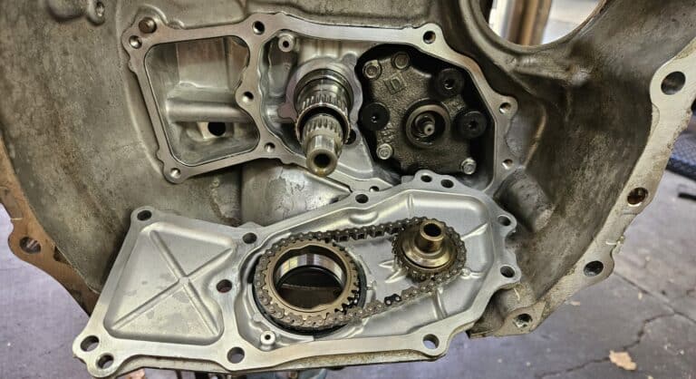 Subaru CVT transmission with oil pump cover off for leak repair.