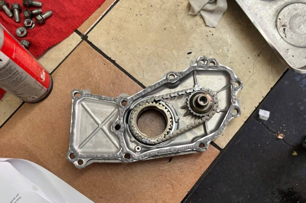 CVT oil pump cover with new sealant