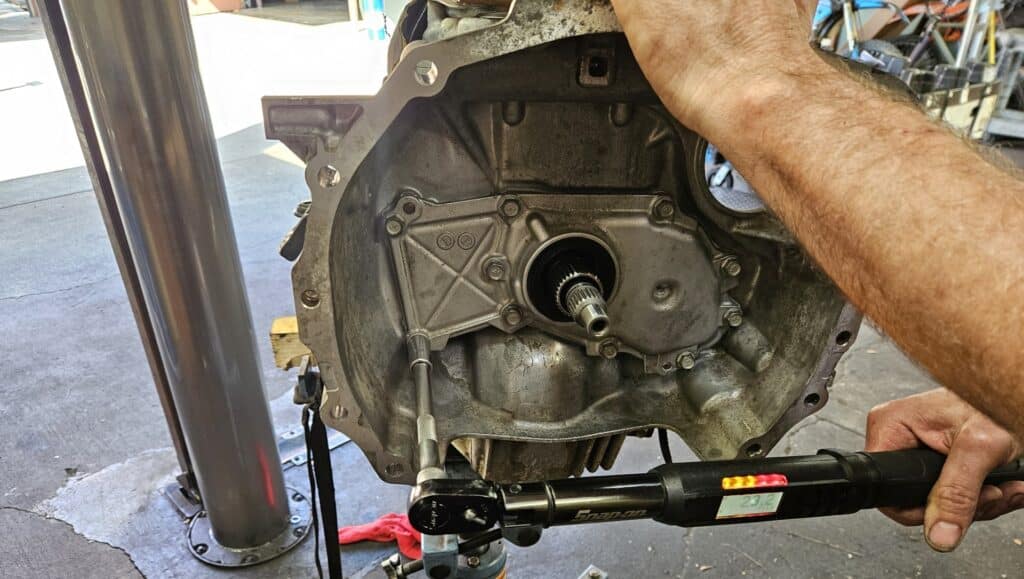 Using a torque wrench to tighten the Subaru oil pump cover