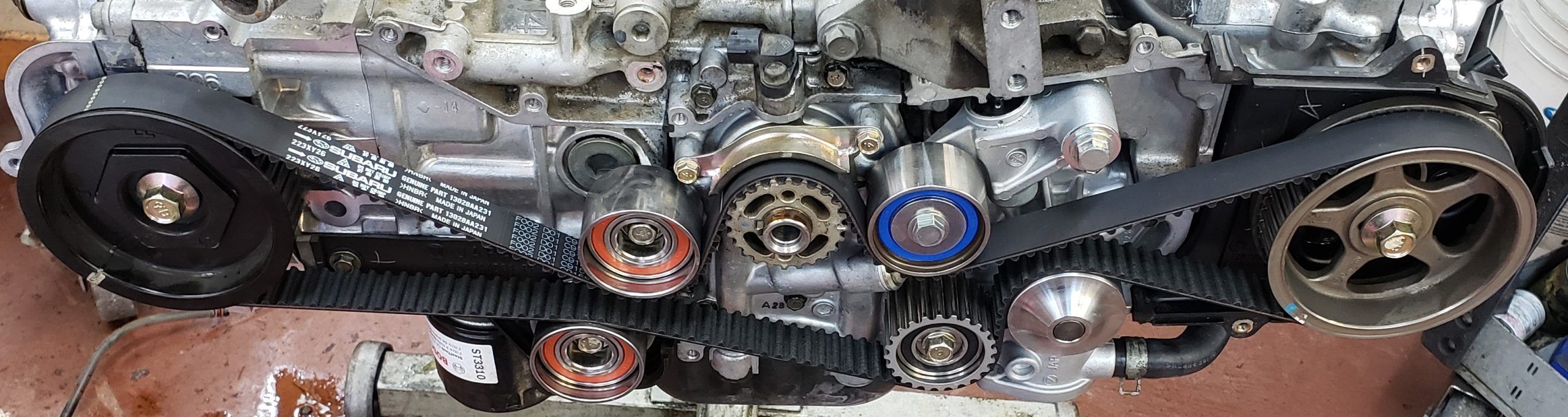 Subaru engine being repaired on an engine stand