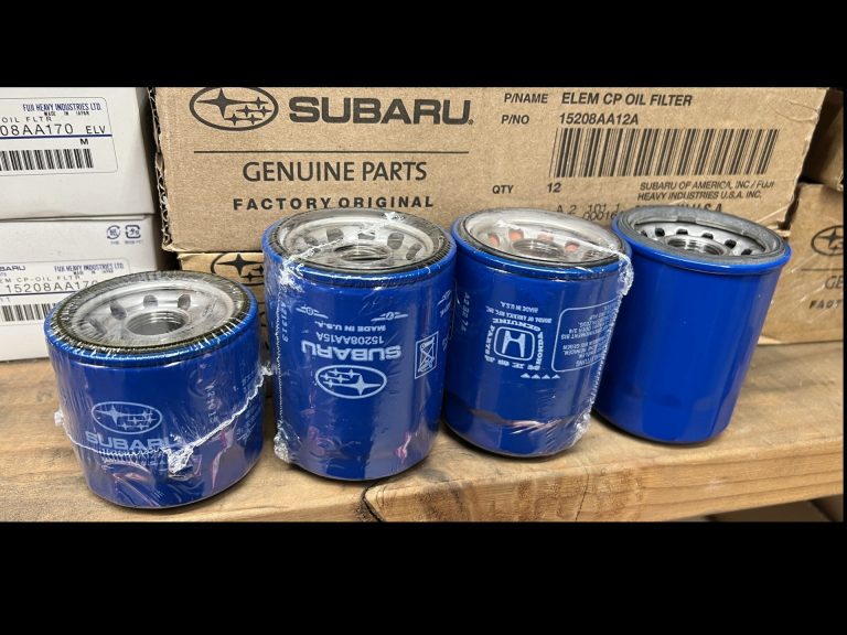 Four different types of Subaru oil filters next to each other.
