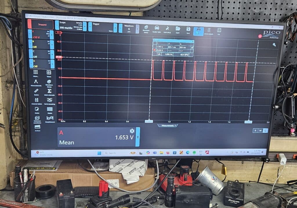 An image of an oscilloscope with a square wave.