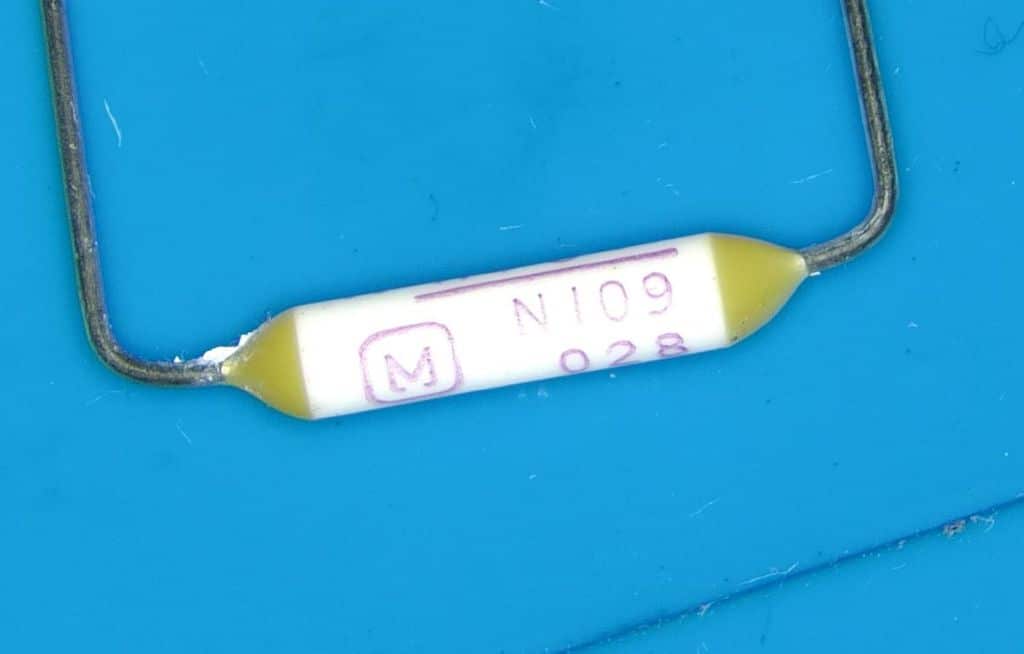A magnified image of a N109 thermal cutoff from a Honda blower transistor.