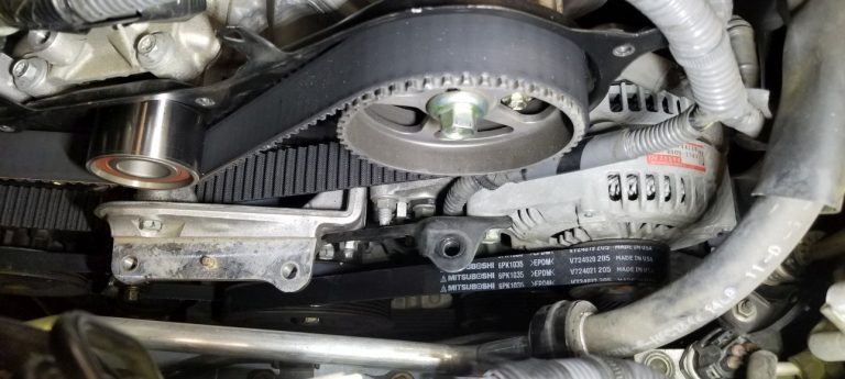 A replacement timing belt fitted to an engine